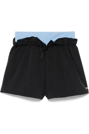 OFF-WHITE Shorts con design a strati