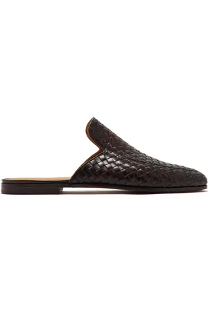 Magnanni Mules in pelle con design intrecciato
