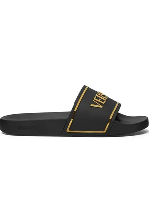 VERSACE Sandali slides con stampa
