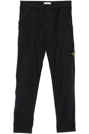 Stone Island Pantaloni con applicazione Compass