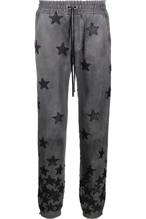 AMIRI Pantaloni sportivi con stampa