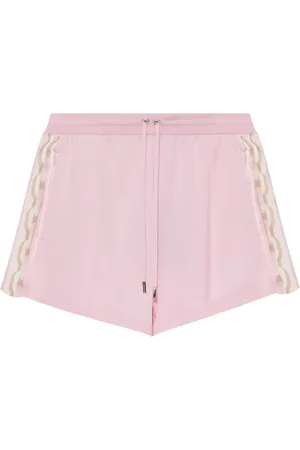 VERSACE Shorts con catena