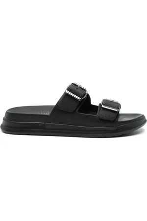 Tommy Hilfiger Sandali slides in pelle con fibbia