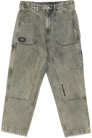 A Bathing Ape Jeans con logo Moonface ed effetto schiarito