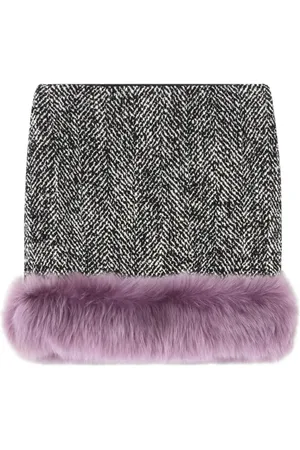 VERSACE Minigonna con bordo in shearling