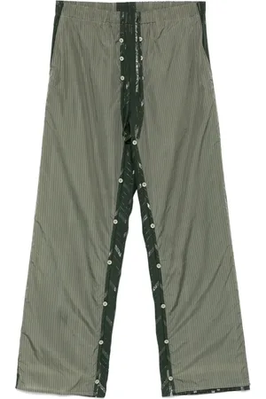 CRAIG GREEN Pantaloni con design a strati