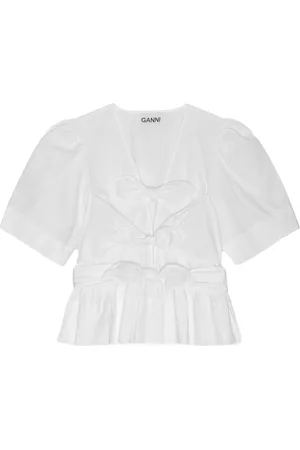 Ganni Blusa con peplum