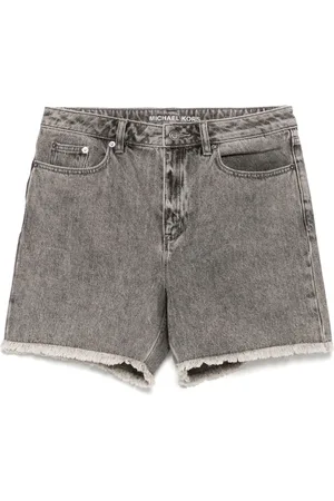 Michael Kors Shorts denim con bordi sfrangiati
