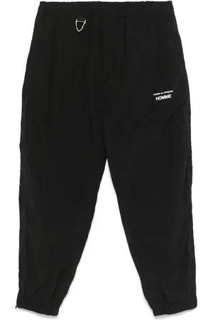 Comme des Garçons Pantaloni sportivi con stampa