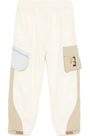 KIDSUPER STUDIOS Pantaloni con applicazione logo