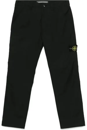 Stone Island Pantaloni con applicazione Compass