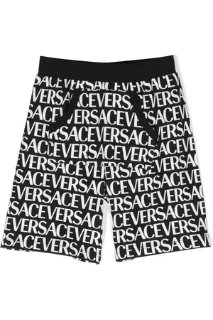 VERSACE Shorts sportivi con stampa