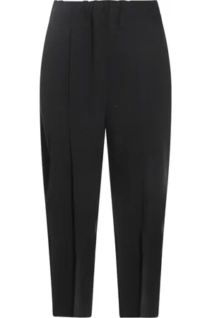 Issey Miyake Pantaloni affusolati con pieghe