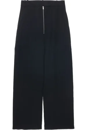 STUDIO NICHOLSON Pantaloni a palazzo con zip