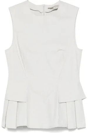 REMAIN Top con peplum