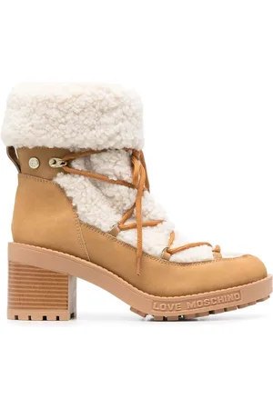 Moschino Stivaletti con bordo in shearling