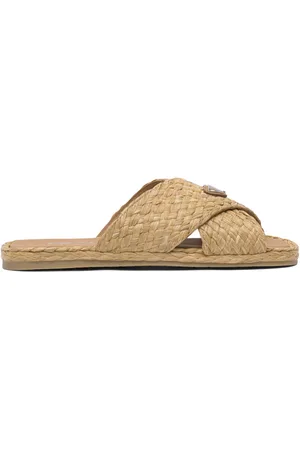 Prada Sandali slides intrecciati con suola piatta