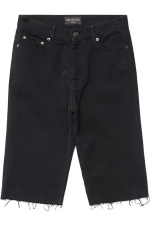 Balenciaga Shorts denim con orlo sfilacciato