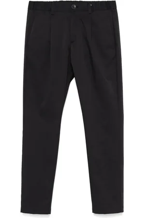 HERNO Pantaloni affusolati con placca logo