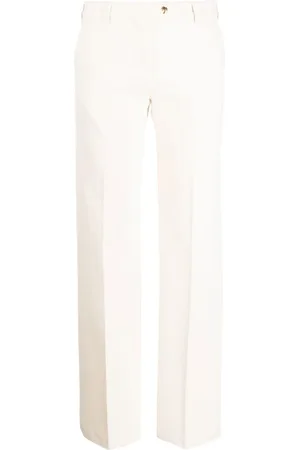 Palm Angels Jeans svasati con placca logo