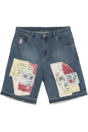 KIDSUPER STUDIOS Shorts denim con design patchwork