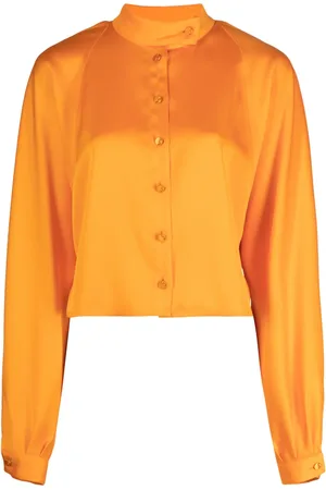 GENNY Blusa con colletto a cinturino