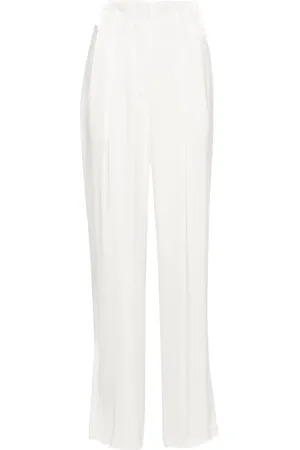 GENNY Pantaloni a palazzo con pieghe