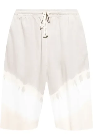 Maison Margiela Shorts sportivi con fantasia tie-dye