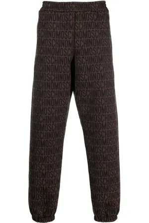 Moschino Pantaloni sportivi con logo all-over