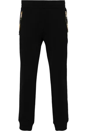 Moschino Pantaloni sportivi con stampa