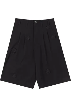 SONG FOR THE MUTE Shorts neri con ricamo margherite