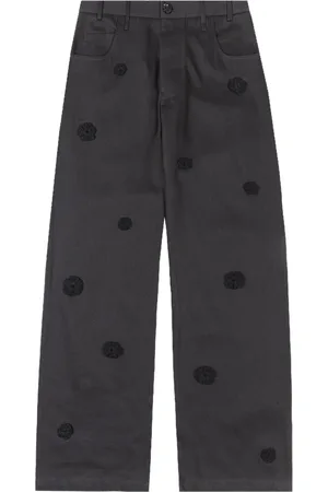 SONG FOR THE MUTE Jeans neri con ricamo margherite