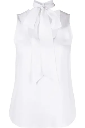 Moschino Blusa smanicata con fiocco