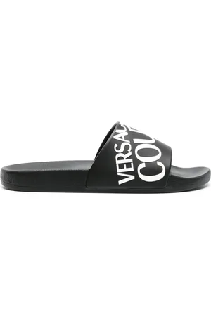 VERSACE Sandali slides con logo goffrato
