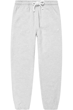 New Balance Pantaloni sportivi con logo