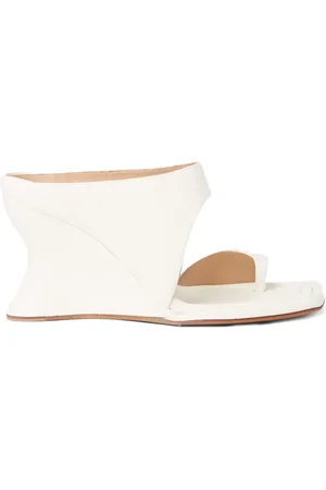 Sportmax Mules in pelle con zeppa
