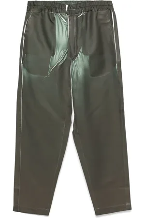 Comme des Garçons Pantaloni con stampa denim