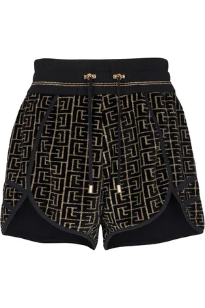 Balmain Shorts da corsa con monogramma