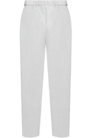 Issey Miyake Pantaloni dritti con pieghe