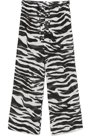 The Attico Pantaloni semi trasparenti con stampa zebra