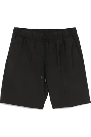 COSTUMEIN Shorts con finitura craquel??