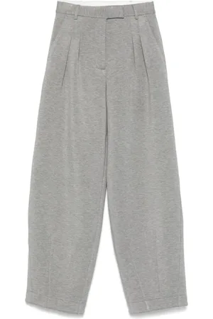 REMAIN Pantaloni dal design morbido