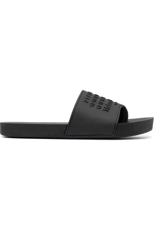 Maison Margiela Sandali slides Tabi con logo goffrato