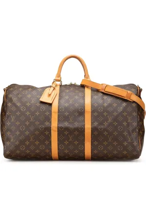 LOUIS VUITTON 1997 Monogram Keepall Bandouliere 55 travel bag