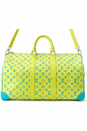 LOUIS VUITTON 2023 Monogram Playground Keepall Bandouliere 50 travel bag