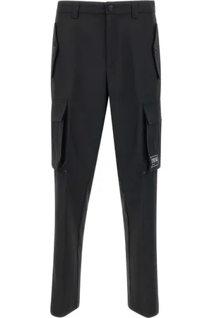 VERSACE Pantaloni sartoriali con applicazione logo