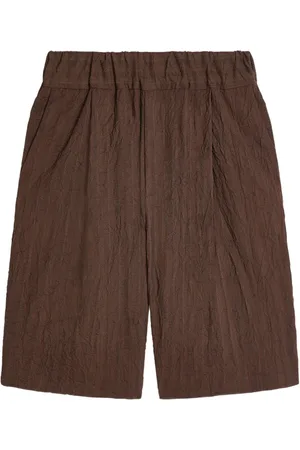 DRIES VAN NOTEN Shorts con pieghe