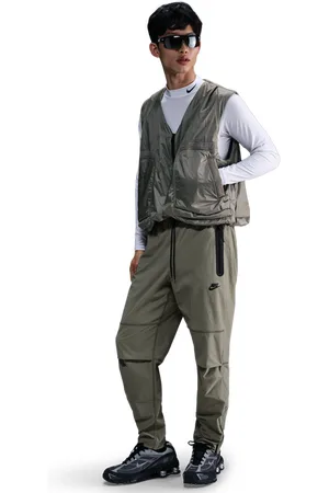 Nike Tech Woven male Pantaloni - Verde - Foot Locker