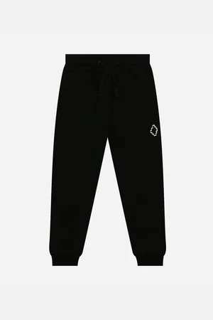 MARCELO BURLON Pantaloni con stampa