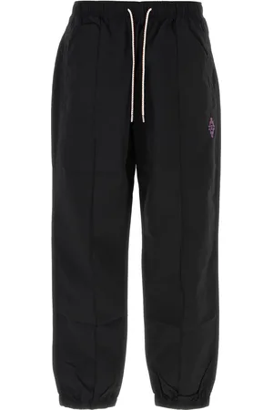 MARCELO BURLON Pantalone in nylon nero UOMO